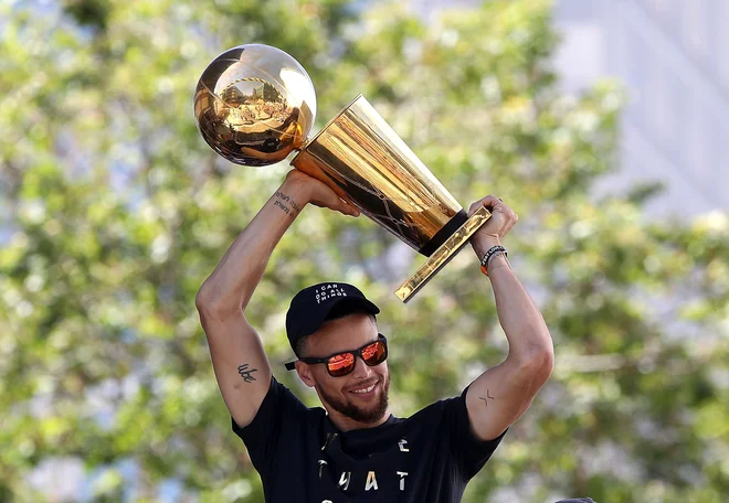 Stephen Curry je lani zavrnil sprejem pri predsedniku. FOTO: AFP