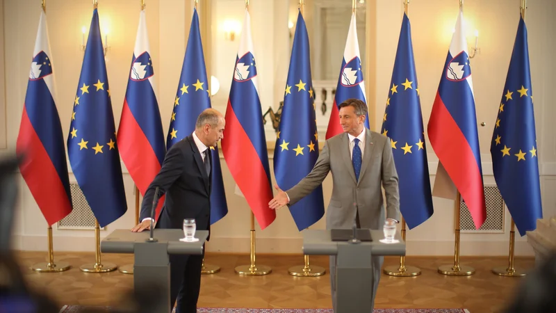 Fotografija: Zmagovalec volitev Janez Janša pri predsedniku Borutu Pahorju. FOTO: Jure Eržen