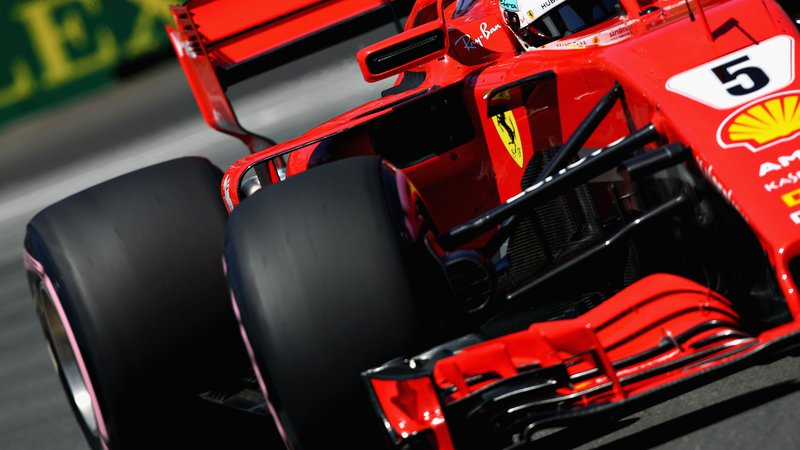 Fotografija: Sebastian Vettel je prekinil Ferrarijev kvalifikacijski urok v Montrealu. Foto Mark Thompson/AFP