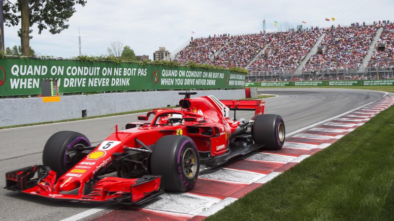Fotografija: Sebastian Vettel se je po štirih dirkah vrnil na vrh zmagovalnega odra. Foto Ryan Remiorz/AP