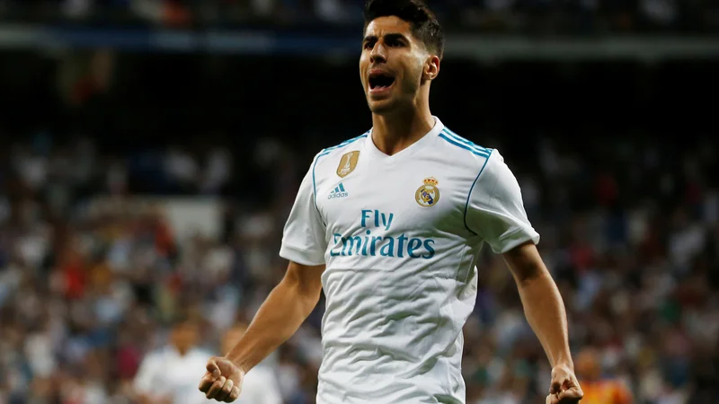 Fotografija: Marco Asensio Willemsen, 22-letni član madridskega Reala, ki po slogu igre še najmočneje spominja na živo legendo Lionela Messija. FOTO: Retuers