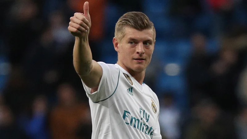 Fotografija: Toni Kroos se je letos v Kijevu razveselil že četrte lovorike v ligi prvakov. Foto Reuters