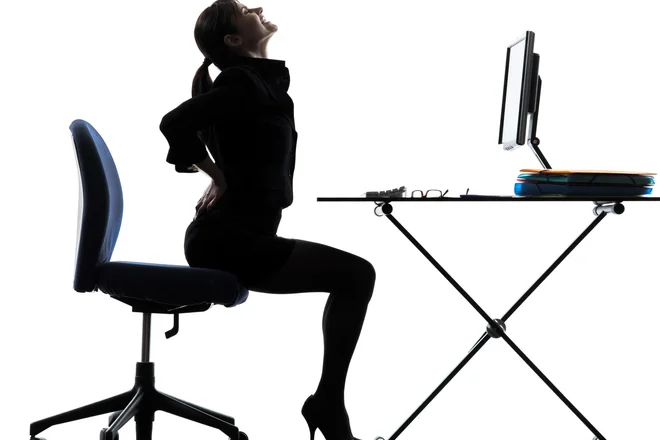 one business woman sitting backache pain silhouette studio isolated on white background; Shutterstock ID 138435938; PO: aol; Job: production; Client: drone