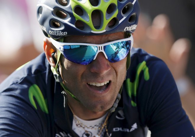 Movistar team rider Alejandro Valverde of Spain crosses the finish line to win the Fleche Wallonne Classic cycling race in Huy April 22, 2015. REUTERS/Francois Lenoir