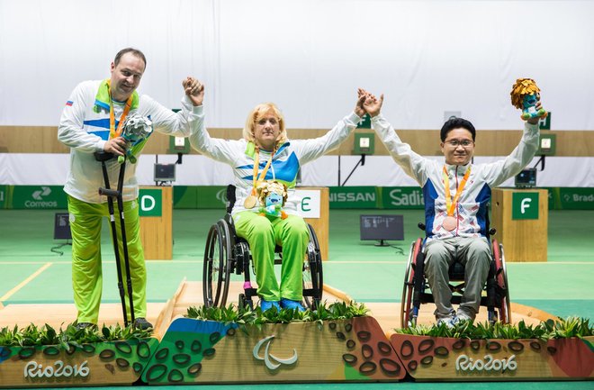 Second placed Francek Gorazd Tirsek - Nani of Slovenia, Winner Veselka Pevec of Slovenia and third placed Geunscoo Kim of Korea celebrate at medal ceremony after the Final of R4 - Mixed 10m Air Rifle Standing SH2 on day 3 during the Rio 2016 Summer Paraly
