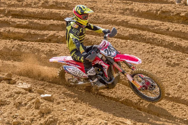 Tim Gajser si je pridirkal prve stopničke v letošnji sezoni, zaostal je zgolj za Jeffreyjem Herlingsom in Tonyjem Cairolijem. FOTO: Honda Pro Racing