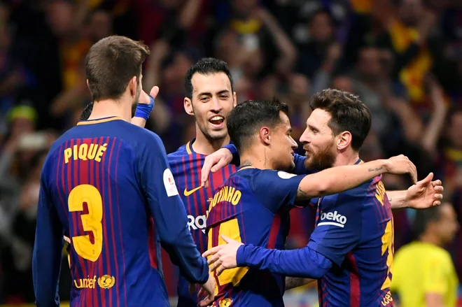 Nogometaši Barcelone so do vrha napolnili Sevillino mrežo. Foto Pierre-Philippe Marcou/AFP