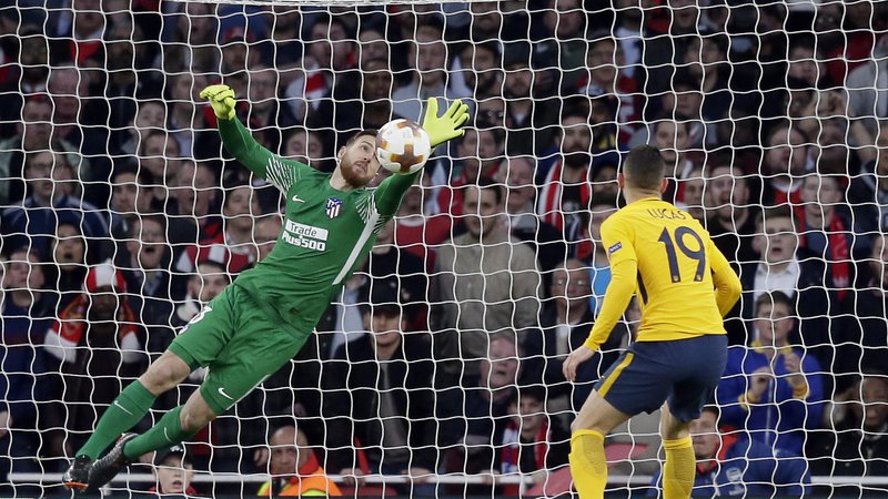 Fotografija: Jan Oblak je v obup spravljal Arsenalove nogometaše. FOTO: AP
