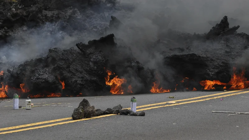 Fotografija: Kilauea je eden najaktivnejših vulkanov na svetu. Lava iz vulkana se razliva po okolici.