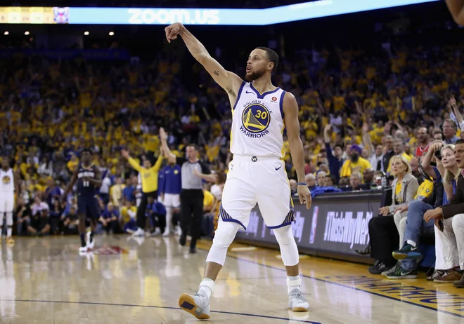 Steph Curry je nazaj, trojke spet padajo z vseh strani. FOTO: Ezra Shaw/Afp