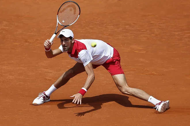 Novak Đoković se je dvakrat doslej okitil z madridsko lovoriko, letos je izpadel že po drugem dvoboju. Foto&nbsp;Paul White/AP
