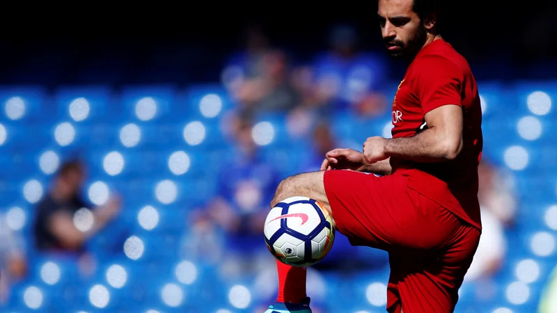 Fotografija: Mo Salah zbira individualne nagrade kot za stavo. Foto Eddie Keogh/Reuters