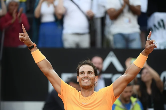 Rafael Nadal je še osmič stopil na vrh v Rimu. FOTO: Filippo Monteforte/Afp
