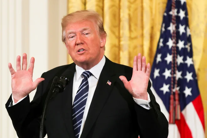 Po zadnjih podatkih so menda Donaldu Trumpu (na fotografiji) pri zmagi pomagali ne samo Rusi, pač pa morda celo arabski princi. FOTO: Kevin Lamarque/Reuters