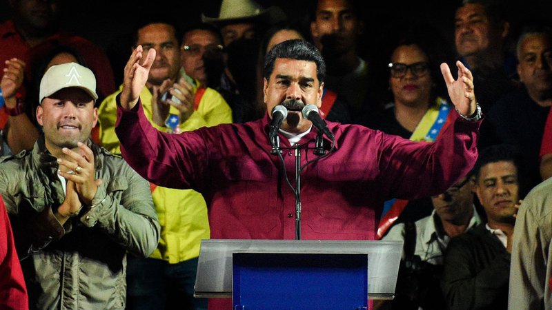 Fotografija: »Mir in demokracija sta zmagala,« je ob ponovni izvolitvi dejal Maduro. FOTO: Federico Parra/AFP