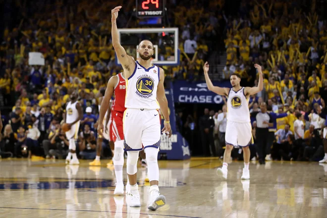 Golden State je letel na krilih Stepha Curryja in dobre obrambe. FOTO: Ezra Shaw/Afp
