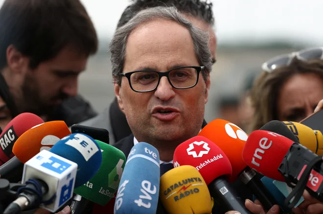 Torra je medtem danes v novem znaku kljubovanja Madridu že obiskal v zaporu pri Madridu priprte katalonske politike. FOTO: Sergio Perez/Reuters