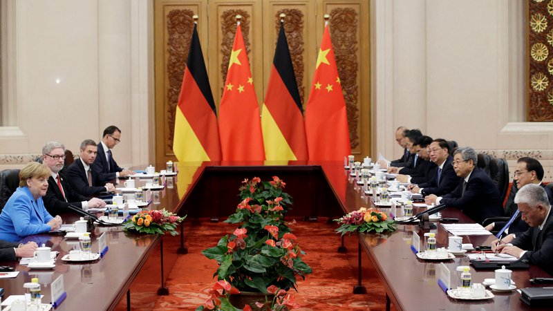 Fotografija: Pogovori med državama se bodo nadaljevali že 9. julija v Berlinu, ko bodo potekale skupne konzultacije nemške in kitajske vlade. FOTO: Jason Lee/Reuters