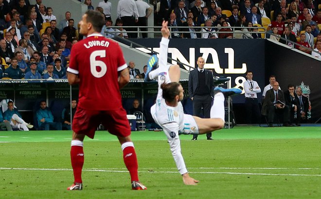 Garet Bale je dosegel enega najlepših golov v finalih. FOTO: Hannah Mckay/Reuters