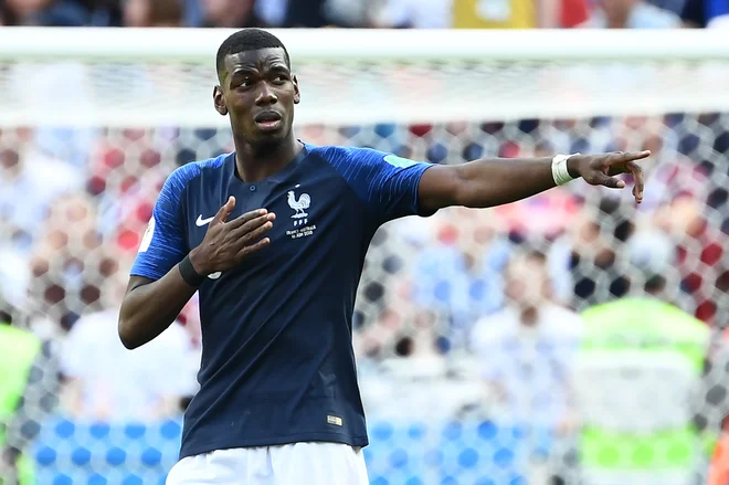 Paul Pogba je z milimetrsko natančnostjo odločil zmagovalca. Foto Franck Fife/AFP