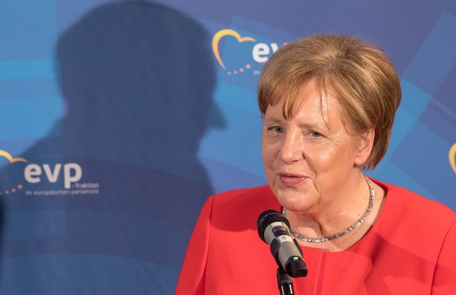 Kanclerka Angela Merkel je poudarila, da po 1. juliju ne bo nobenega avtomatizma pri obravnavanju migrantske krize. FOTO: AFP