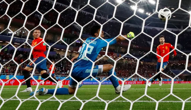 Z golom s peto je rezervist Iago Aspas Španiji zagotovil točko. Foto Gonzalo Fuentes/Reuters