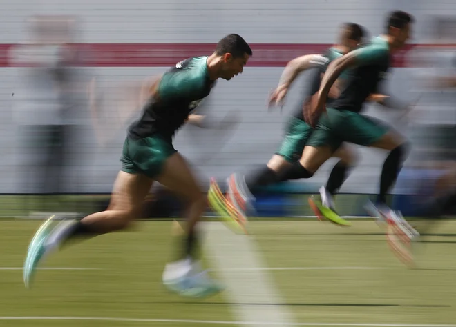 Cristiano Ronaldo je bil kot vselej tudi na zadnjem treningu med najbolj prizadevnimi. Foto Reuters