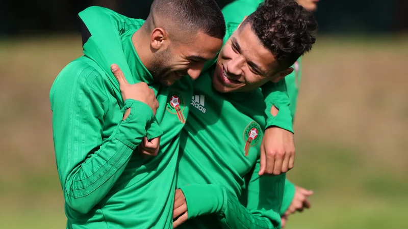 Fotografija: Amine Harit (desno ob Hakimu Ziyechu) mora jutri pred sodnika. Foto Mariana Bazo/Reuters