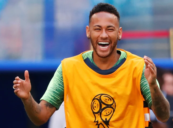 Neymar (levo) na lestvici najboljši strelcev Brazilije s 55 goli, kolikor jih je dosegel tudi Romario, zaostaja le še za Pelejem (77) in Ronaldom (62).<br />
Foto Reuters