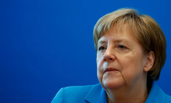 Merklova si želi, da bi CDU in CSU še naprej delali skupaj. »Ker smo zgodba o uspehu za Nemčijo,« je dejala. FOTO: Axel Schmidt/Reuters