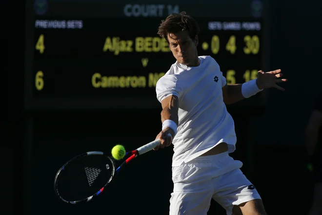 Aljaž Bedene je dobil prvi obračun na sveti travi. FOTO: AFP