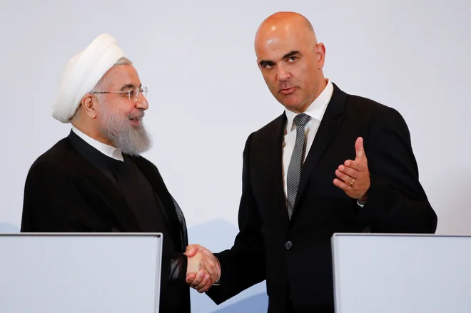 Švicarski predsednik Alain Berset in iranski predsednik Hasan Rohani med srečanjem v Bernu. FOTO: REUTERS/Denis Balibouse&nbsp;