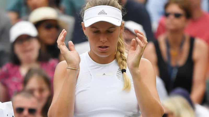 Fotografija: Caroline Wozniacki ni upravičila vloge favoritinje. Foto Toby Melville/Reuters