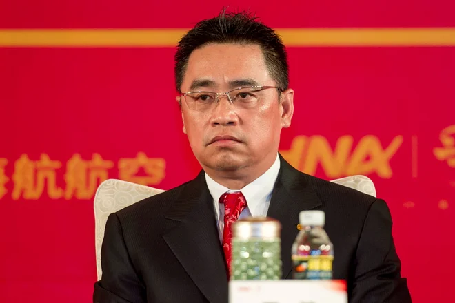 Wang Jian, sopredsedujoči skupine HNA, ki je zelo zadolžena ter pravkar sredi prestrukturiranja in odplačuje del megaposojila. FOTO: Reuters