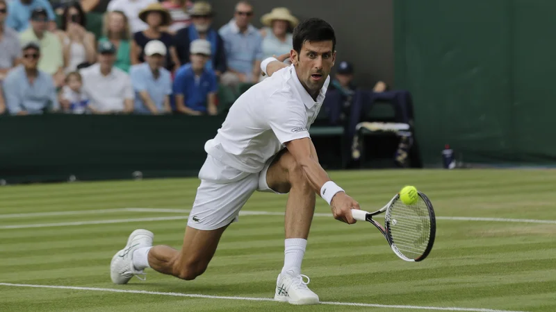 Novak Đoković je v dveh dvobojih skupaj oddal le 12 iger. Foto Ben Curtis/AP