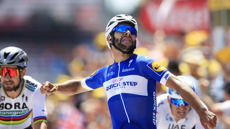 Fotografija: Fernando Gaviria je na prvi etapi na Touru doslej v karieri opravil s konkurenco. Foto Peter Dejong/AP