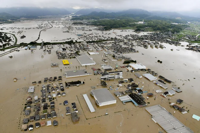 Deževje se bo nadaljevalo. FOTO: Shingo Nishizume/Ap