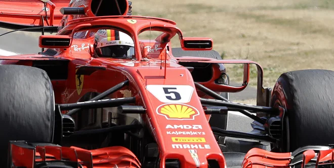 Sebastian Vettel je najbolje začel in najbolje končal dirko. Foto Luca Bruno/AP