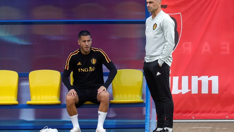 Fotografija: Belgijski dvojec adutov za nov podvig proti Franciji sta selektor Roberto Martinez (desno) in napadalec Eden Hazard.
Foto Reuters