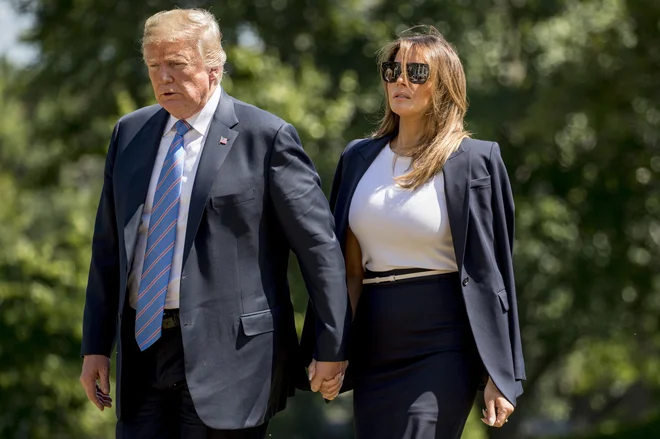 Ameriški mediji pogosto pišejo, da v zakonu predsednika in prve dame ni vse v najlepšem redu. FOTO: Andrew Harnik/AP