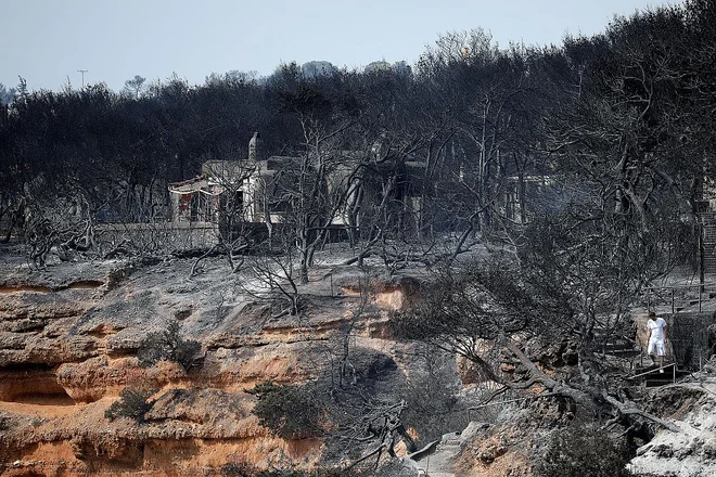 Uničenje, ki ga je za seboj pustil požar v Mati. FOTO: Alkis Konstantinidis/Reuters