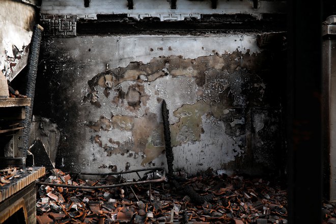 Ožgana hiša v Mati. FOTO: Alkis Konstantinidis/Reuters