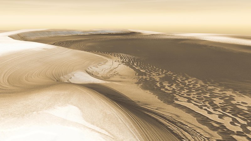 Fotografija: Marsova pola sta oblikovana iz slojev ledu in peska, ki so posledica menjave letnih časov in podnebnih sprememb. Na sliki, ki je sestavljena iz posnetkov Nasinega vesoljskega plovila Odyssey, je dolina Chasma Boreale – kanjon, ki se zajeda 570 kilometrov globoko v severno ledeno planoto. Okoli 1400 metrov visoke stene kanjona tvorijo nanosi mešanice ledu in peska, dno pa je po predvidevanju znanstvenikov iz zamrznjenega peska. Foto Nasa