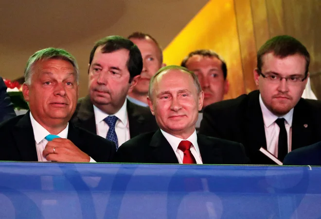 Ruski predsednik Vladimir Putin z madžarskim premierom Viktorjem Orbanom.&nbsp;FOTO: Laszlo Balogh/Reuters