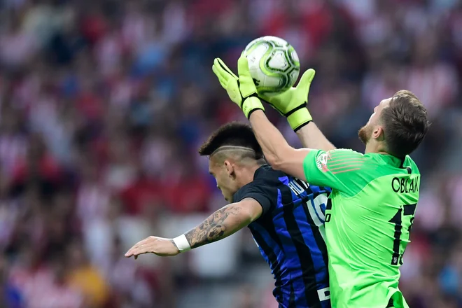 Jan Oblak bo z Atleticom med glavnimi favoriti tudi v ligi prvakov. FOTO: AFP