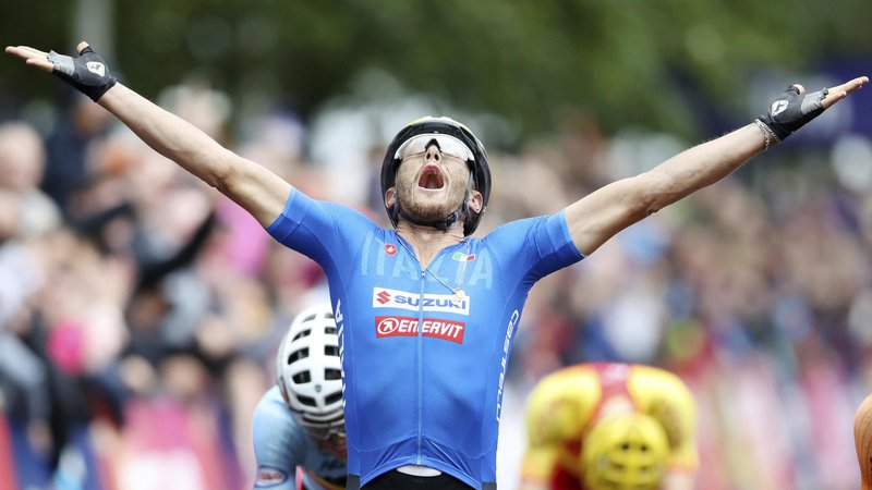 Fotografija: Matteo Trentin je zelo čustveno proslavil zmago. FOTO: John Walton/AP