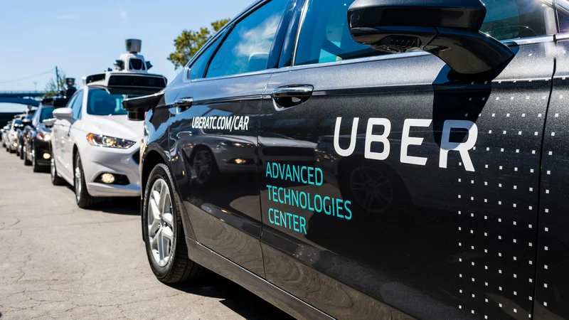 Tehnologija obeh podjetij bo v tem primeru integrirana v posebej za ta namen razvita vozila Toyote, ki bodo vozila prek Uberjeve platforme za naročanje prevozov. FOTO: Angelo Merendino / AFP