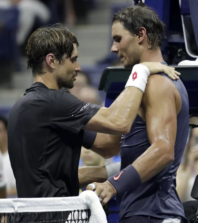 Boljše kulise za zadnji veliki dvoboj si David Ferrer ne bi mogel želeti: največji teniški štadion ter prvi igralec sveta in dober prijatelj Rafael Nadal. Foto AP