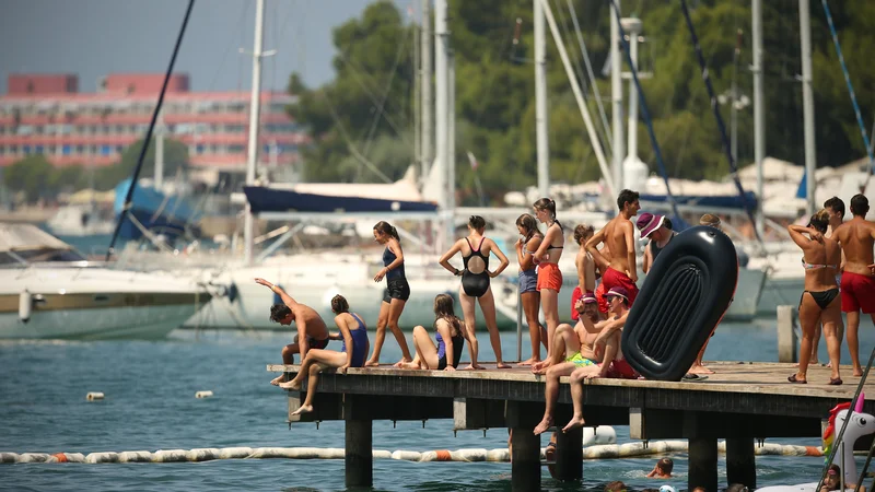 Fotografija: Otroci zaradi vse večjih socialno-ekonomskih razlik v okoljih, iz katerih prihajajo, počitnice preživljajo zelo neenakopravno. FOTO: Jure Eržen/Delo