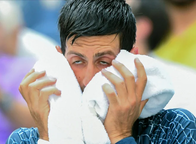 Na odprtem teniškem prvenstvu ZDA v New Yorku sta se pomerila tudi Srb Novak Đoković in Madžar Márton Fucsovics. Zmaga je pripadla Đokoviću. FOTO: Robert Deutsch/Usa Today Sports
